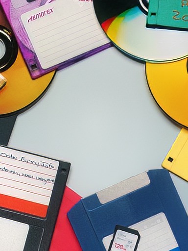 Computer Disks Collage Header with CD, DVD, floppy disks