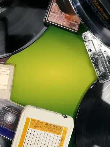 cassette to digital service with audio media digitization showing records and cassette tapes